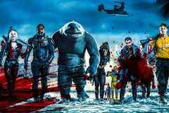 The Suicide Squad walking towards the camera on the beach