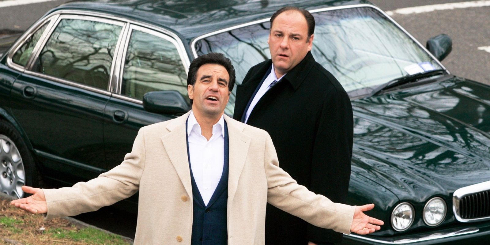 Tony Soprano standing with Little Carmine in The Sopranos