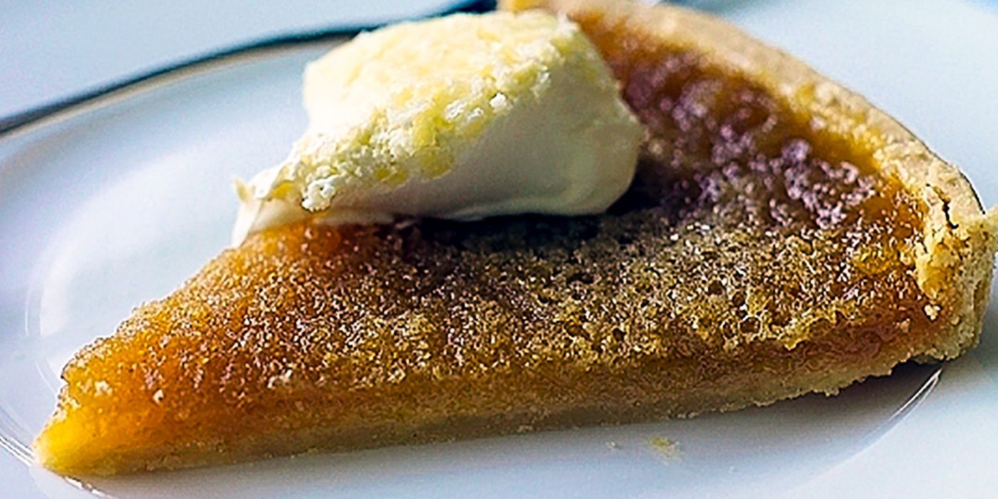 A sticky treacle tart on a hot plate