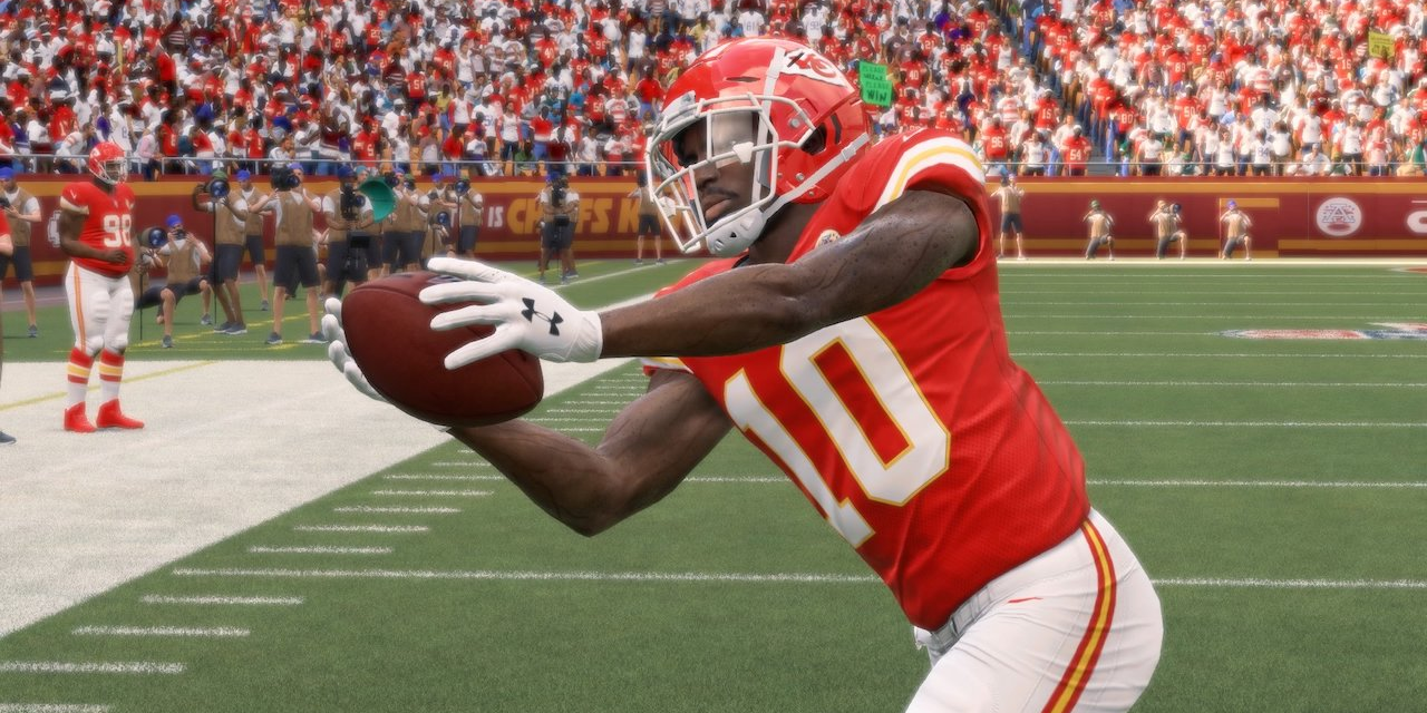 Tyreek Hill catches a pass in Madden