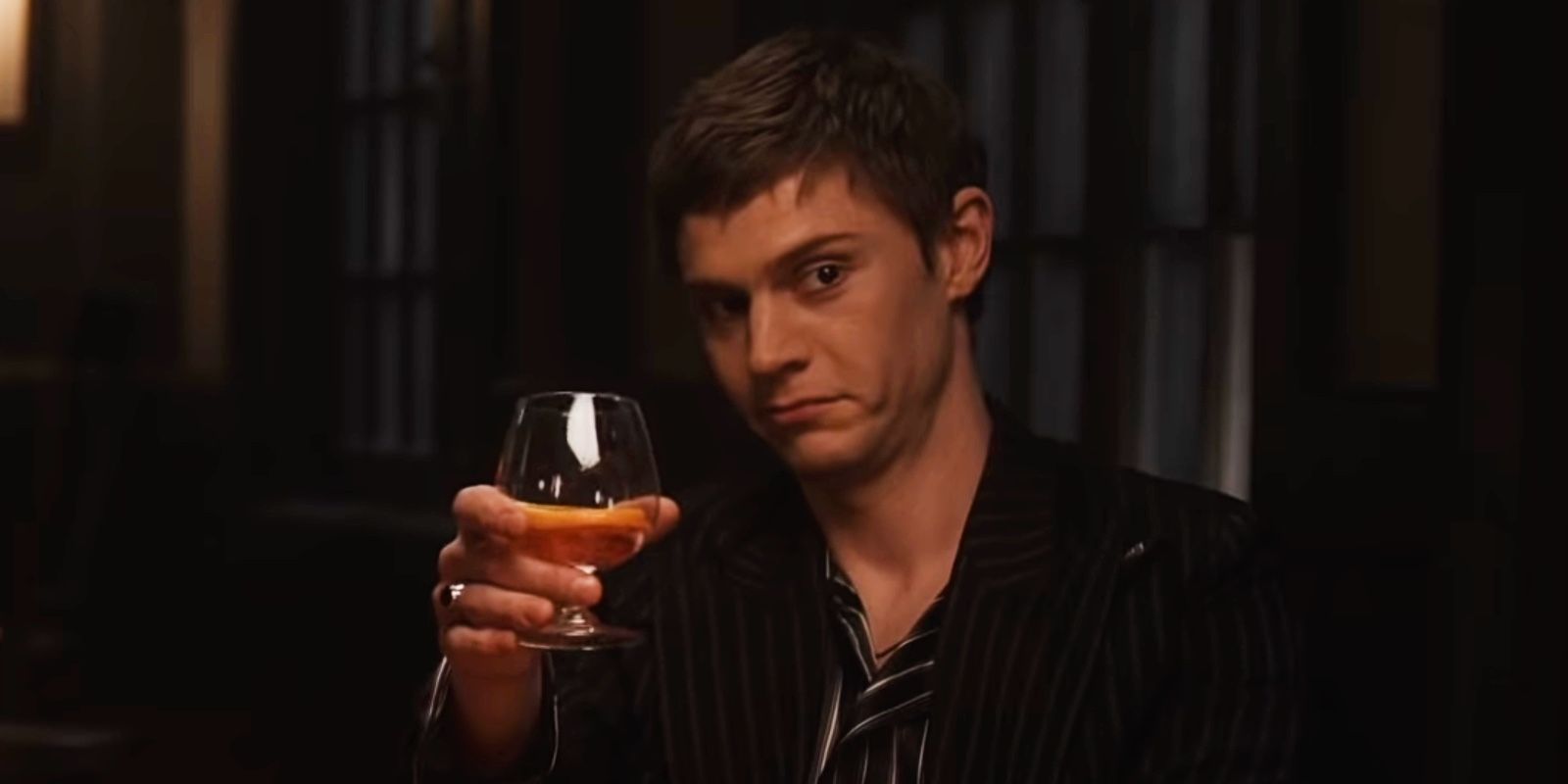 Austin Sommers raising his glass in AHS: Double Feature