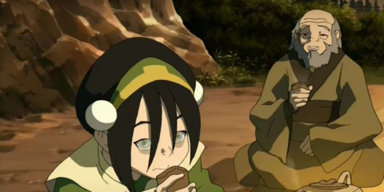 Toph sits in the foreground eating while Uncle Iroh sits in the background in Avatar: The Last Airbender.
