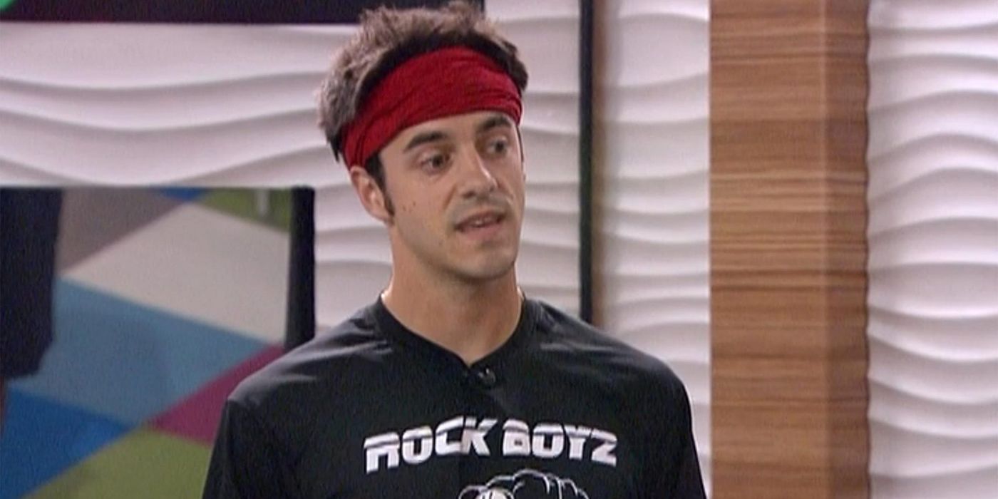 Dan standing up addressing the houseguests at his self-held funeral on Big Brother 14.