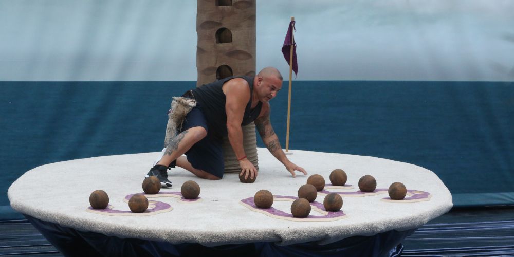 Glenn performs a water challenge in Big Brother Season 18