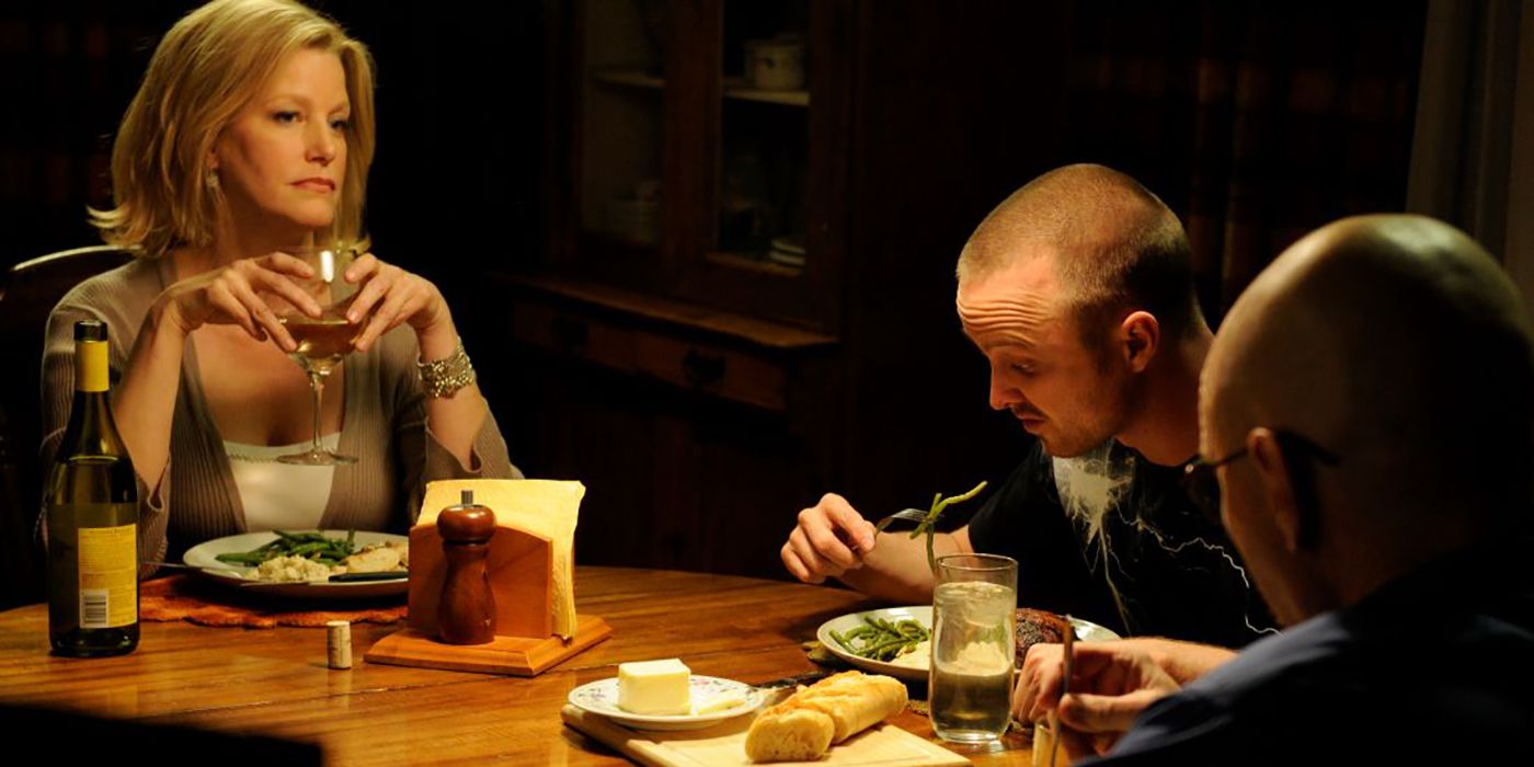 Skyler, Jesse, and Walt at the dinner table in a scene from Breaking Bad.