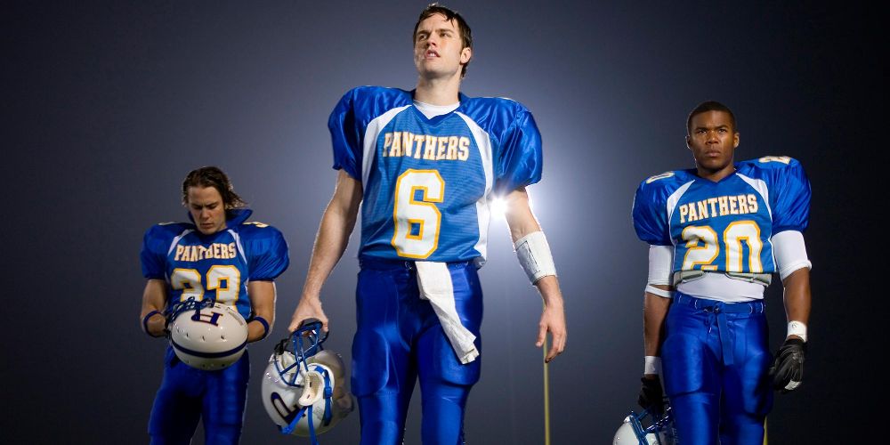Football players walk off the field in the promo image for Friday Night Lights