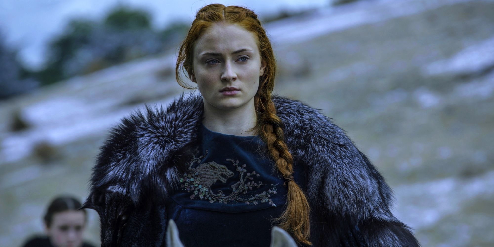 Sansa Stark riding a horse and looking serious in Game of Thrones