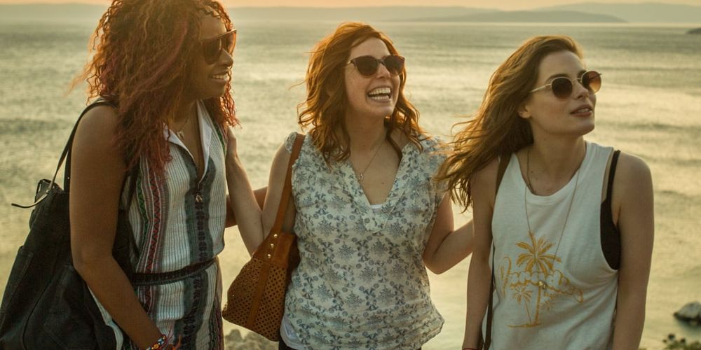 Harper and her friends by the beach at sunset in Ibiza