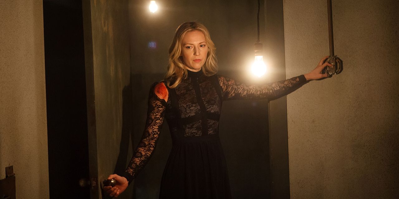 Anna turns on the light in the 2015 film Intruders.