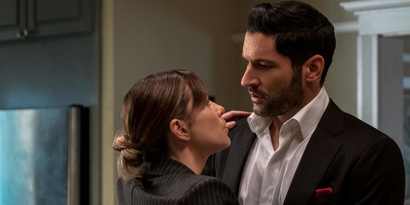 Lucifer and Chloe with their faces close to one another, as if they are about to kiss.