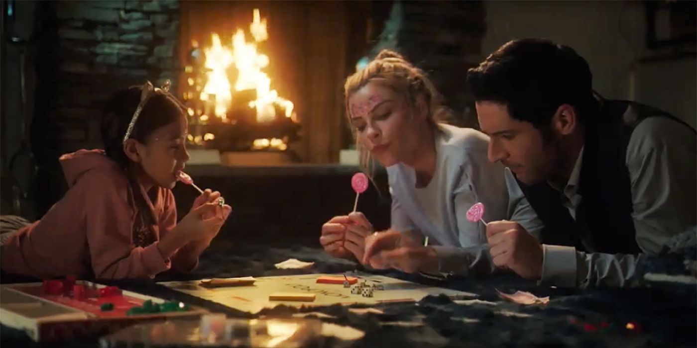 Lucifer, Chloe, and Trixie holding lollipops and playing Monopoly.
