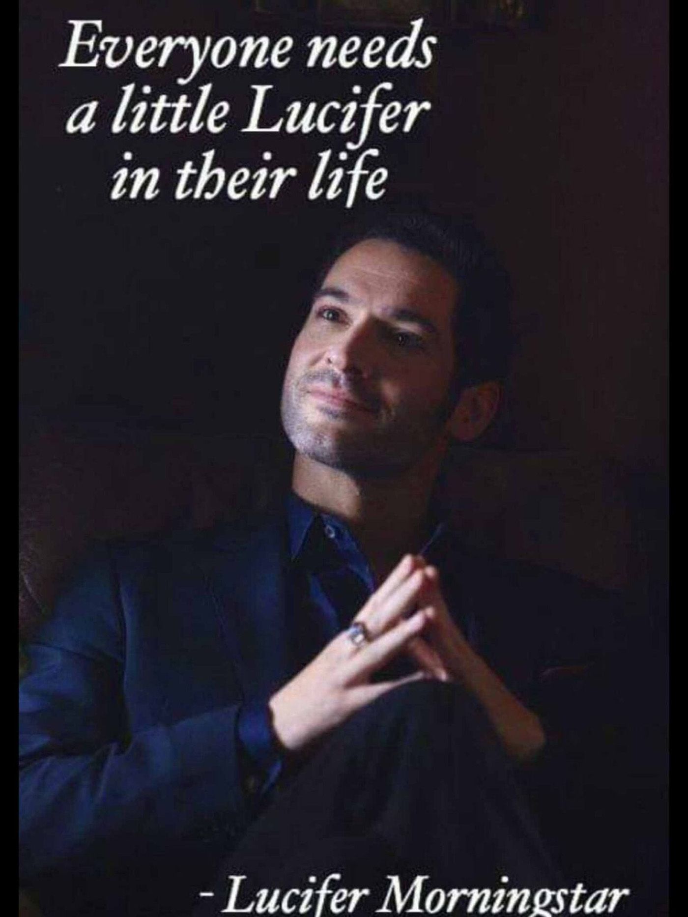 Lucifer with his fingers tented on a black background and a quote in the top, left.