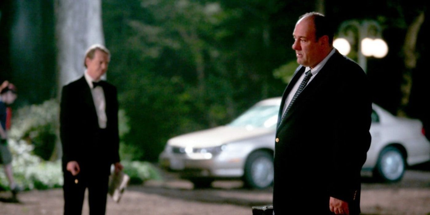 Tony stands with a suitcase in The Sopranos.