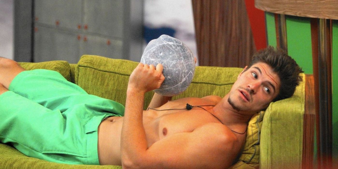 Zach Rance from Big Brother laying on a couch