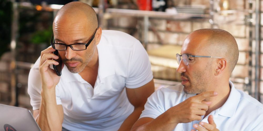 Brett and Jason Oppenheim share a phone conversation on Selling Sunset