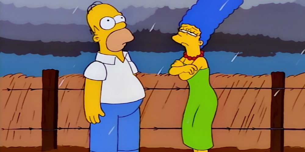 Homer and Marge Simpsons stand in the rain on The Simpsons