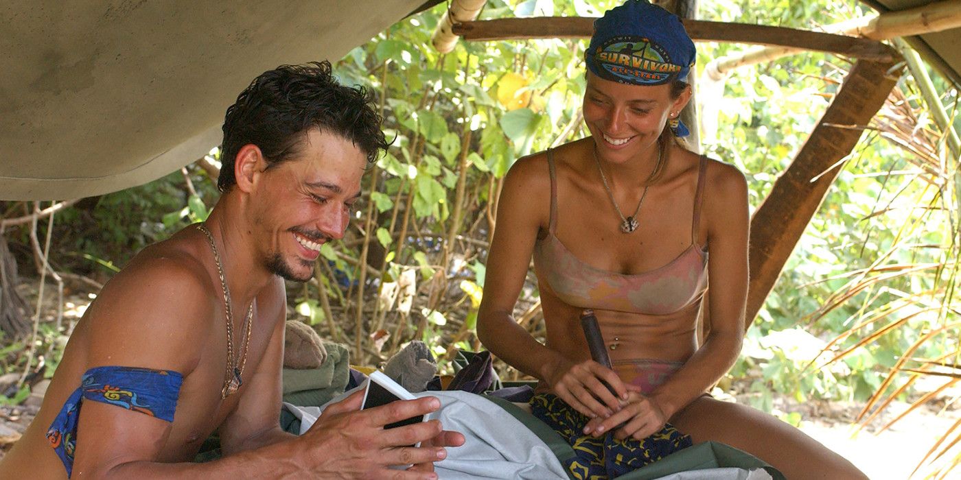 Rob Mariano and Amber Brkich smiling at their tribe's beach on Survivor All Stars