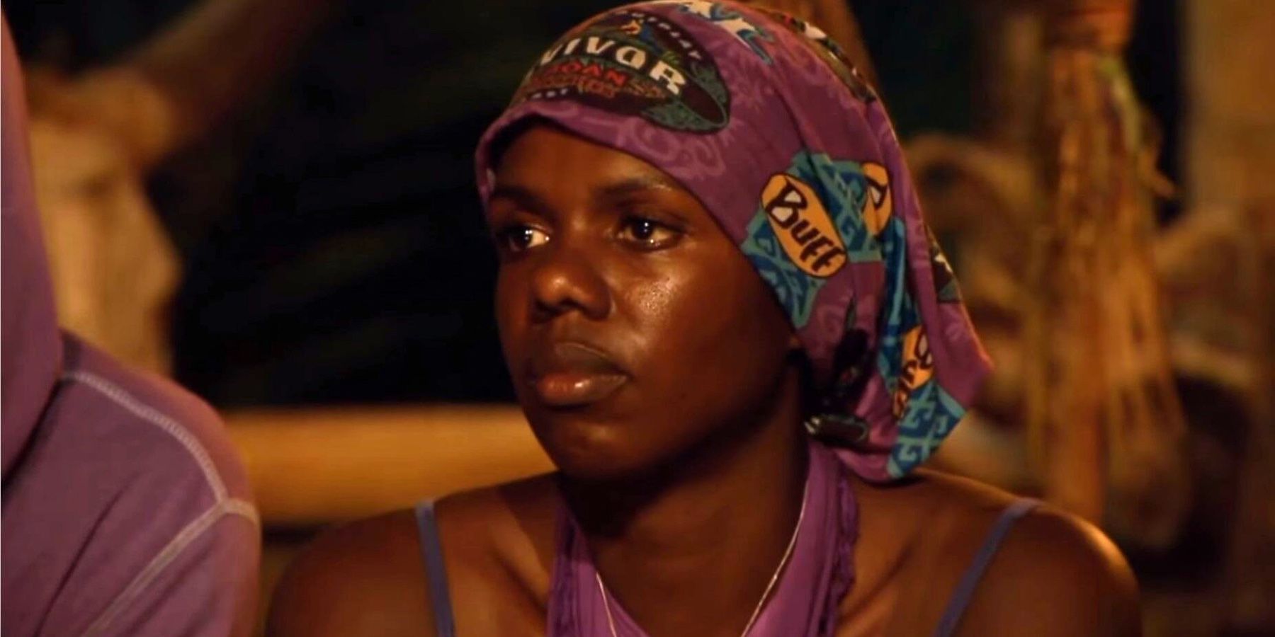 Francesca Hogi looks serious at tribal council on Survivor: Caramoan
