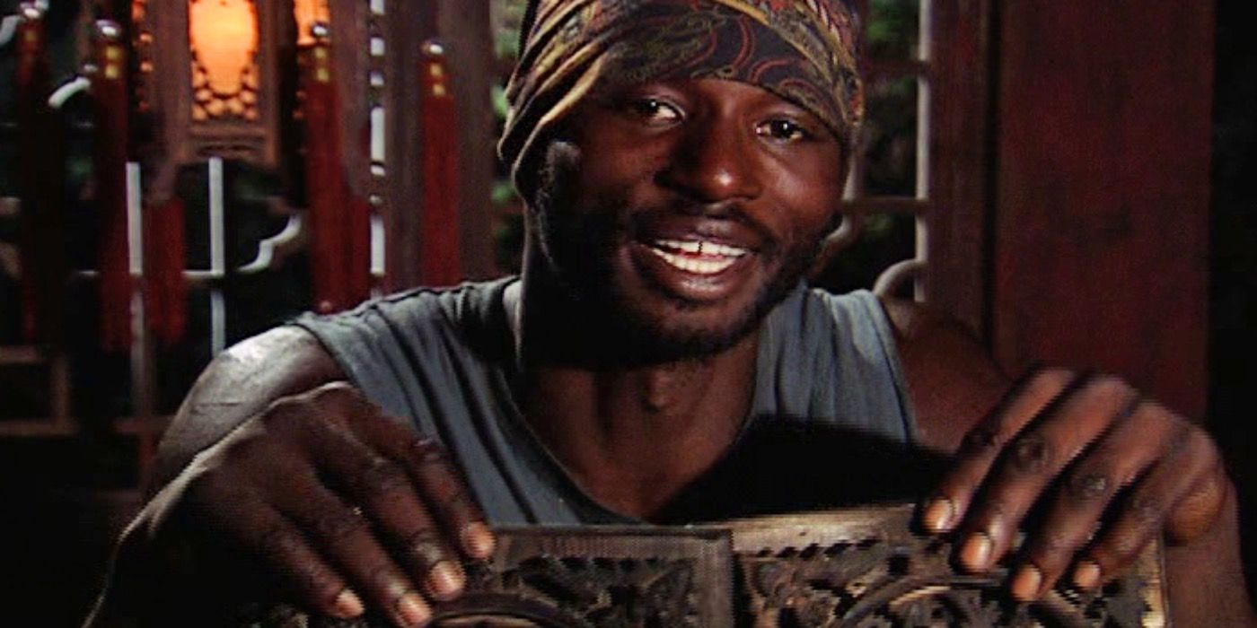James Clement holding up two idols after being voted off Survivor: China