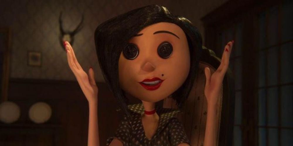 the Other Mother in Coraline with her hands held up beside her head