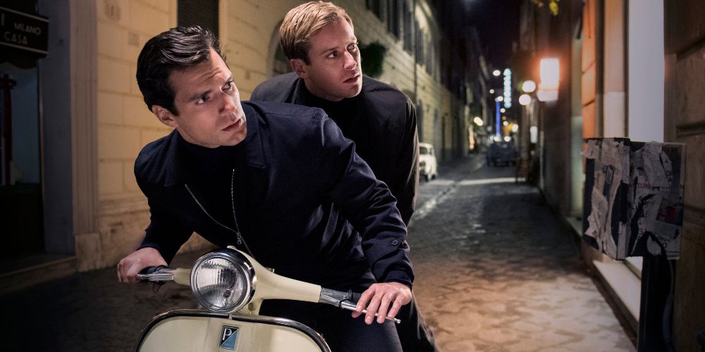 Solo and Illya ride on a motor scooter in The Man From U.N.C.L.E.