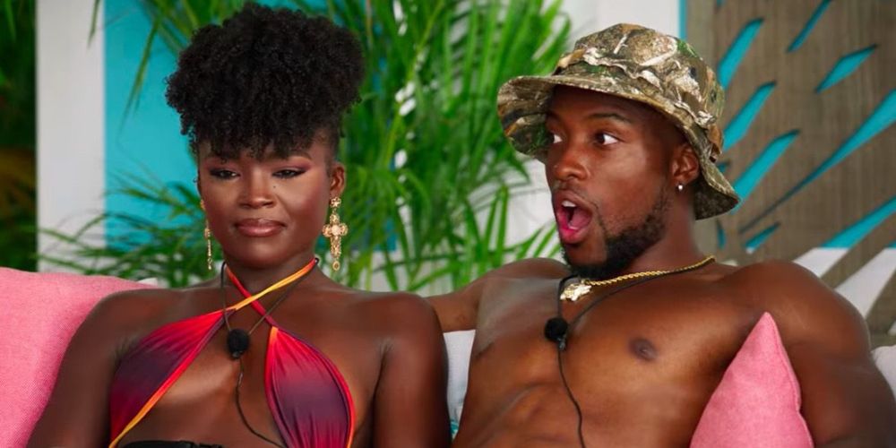 Marvin has a jaw-dropping reaction while sitting next to Melinda on the couch in Too Hot To Handle