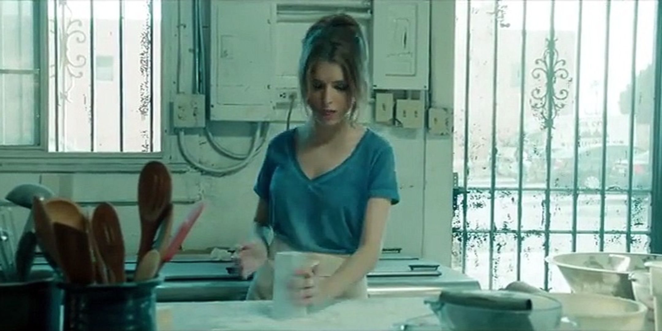 Anna Kendrick in a kitchen in the single Cups