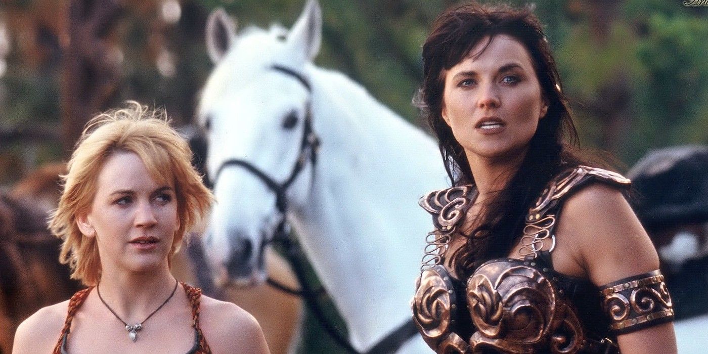 Xena and Gabrielle stand by a white horse in Xena: The Warrior Princess