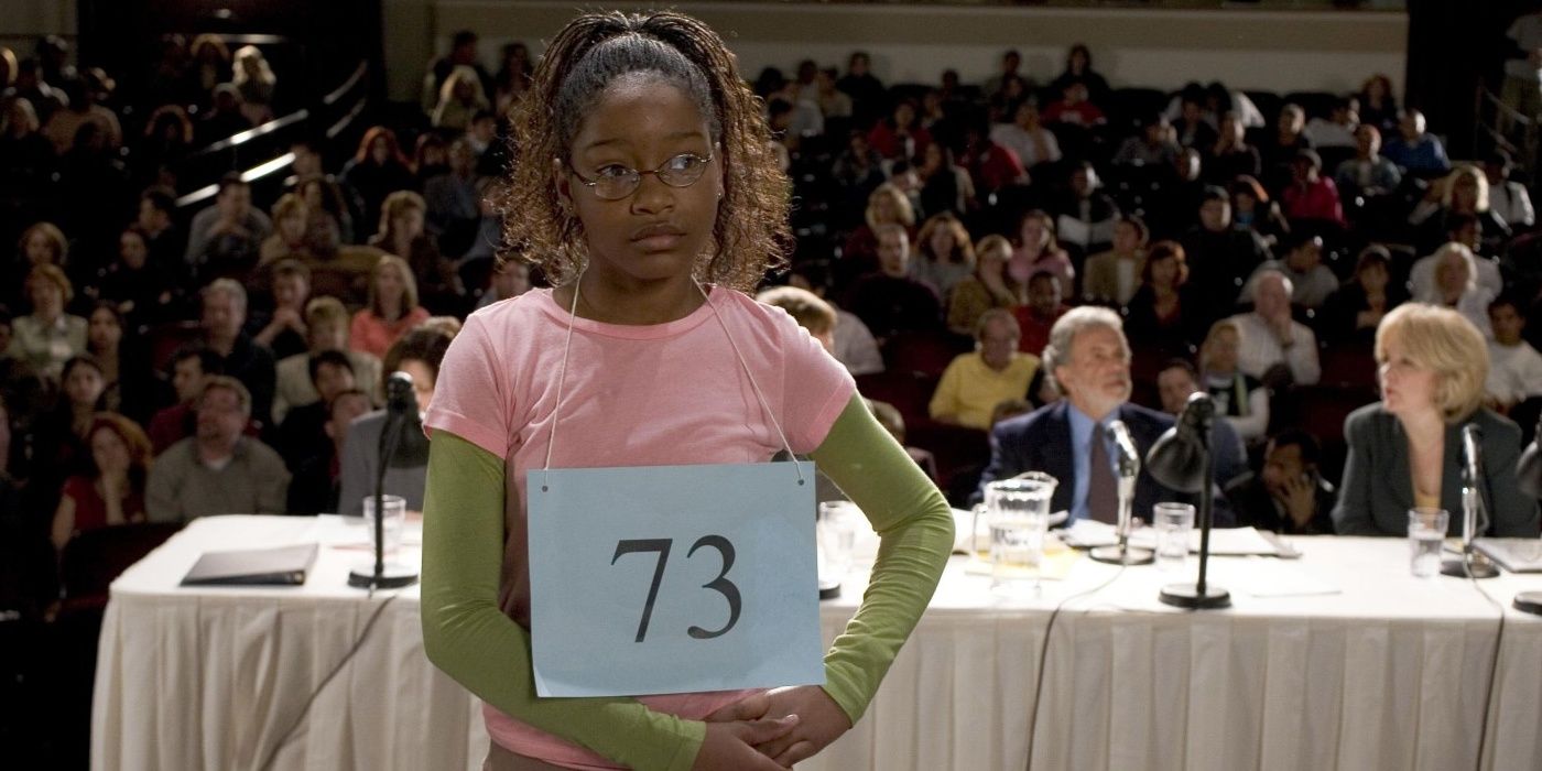 Akeelah standing on stage during a spelling bee in Akeelah and the Bee