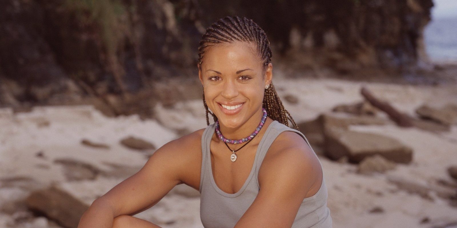 Alicia sitting on the beach in Survivor
