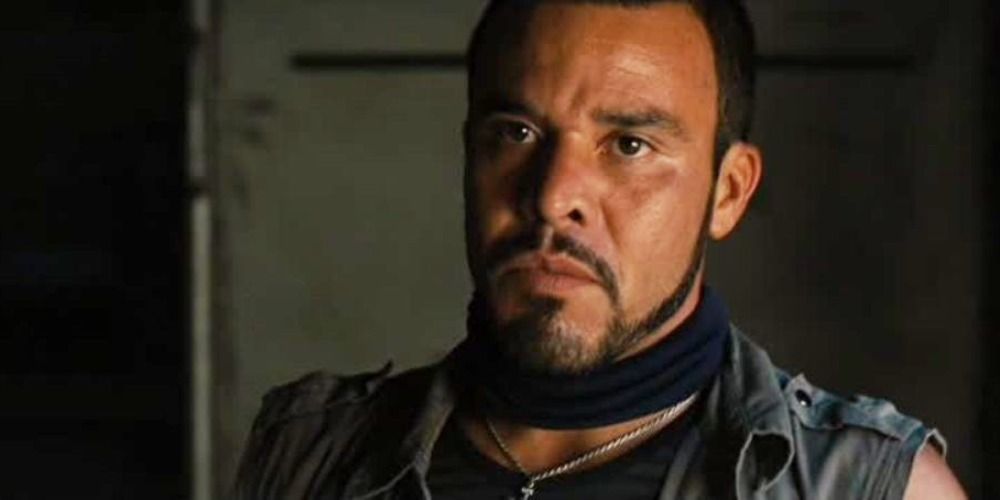 An image of Zizi looking serious in Fast Five