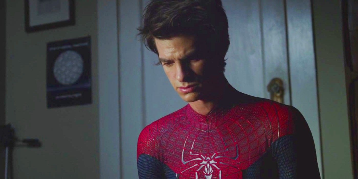 Peter Parker looking down in his Spider-Man suit in The Amazing Spider-Man