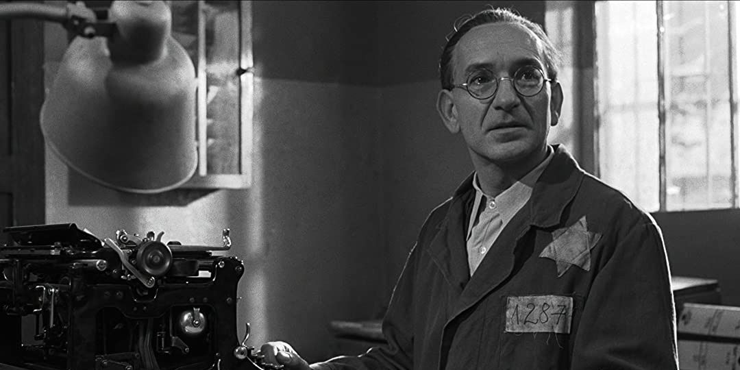 Ben Kingsley typing up the list in Schindler's List
