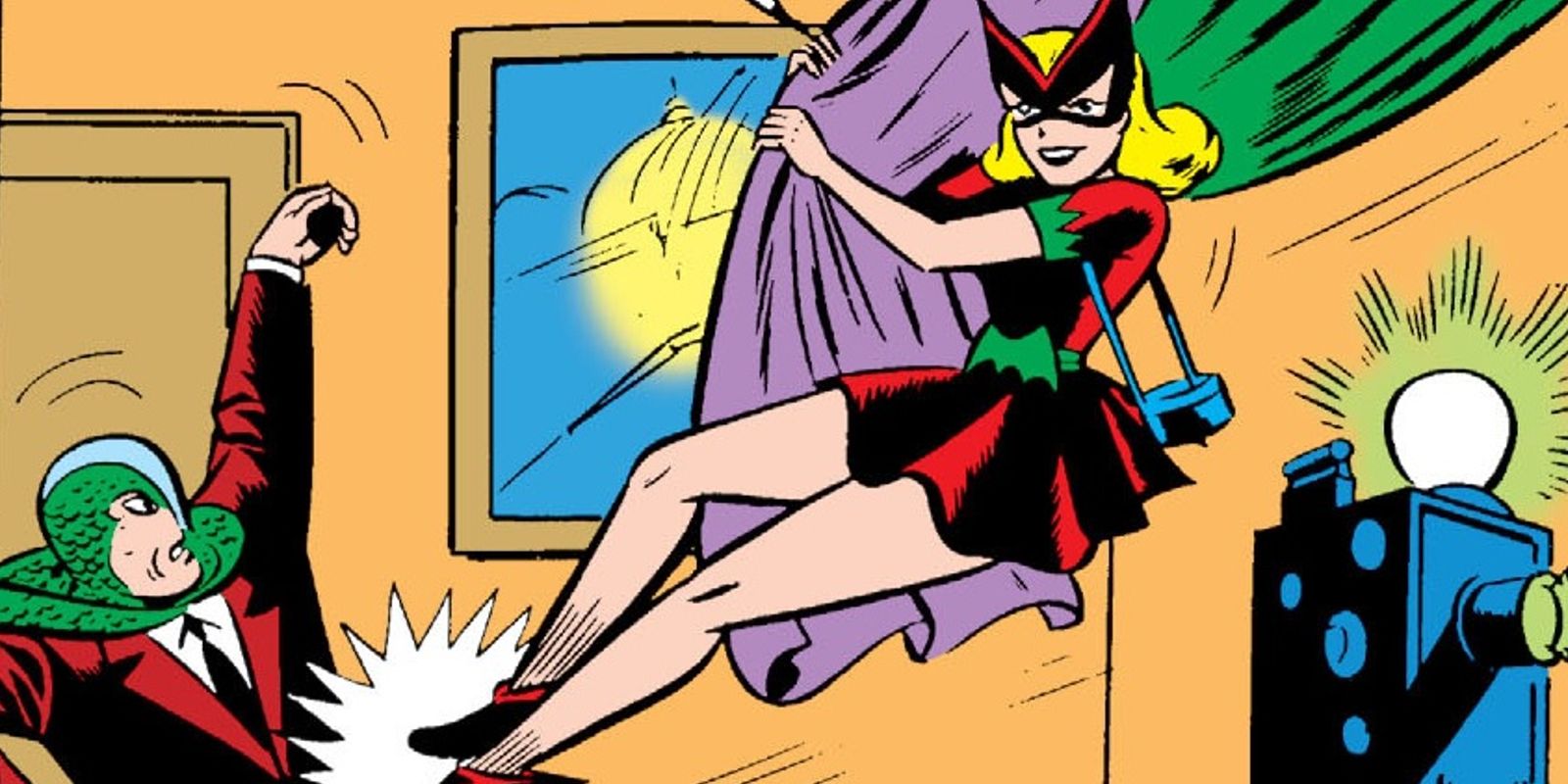 Bette Kane swinging in to save Batman in DC Comics.