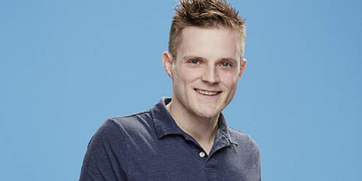 John McGuire posing for a promo photo in Big Brother