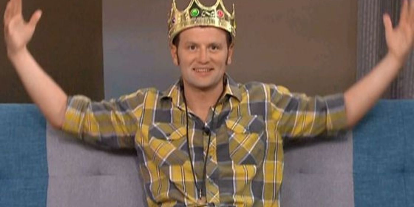 Judd Daugherty wearing a crown and spreading out his arms in Big Brother