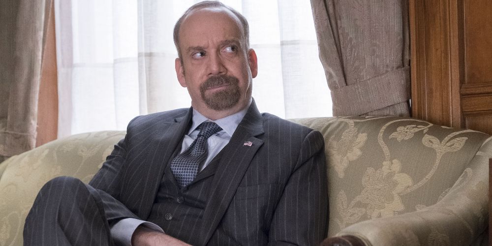 Chuck watches the news inside his office in Billions