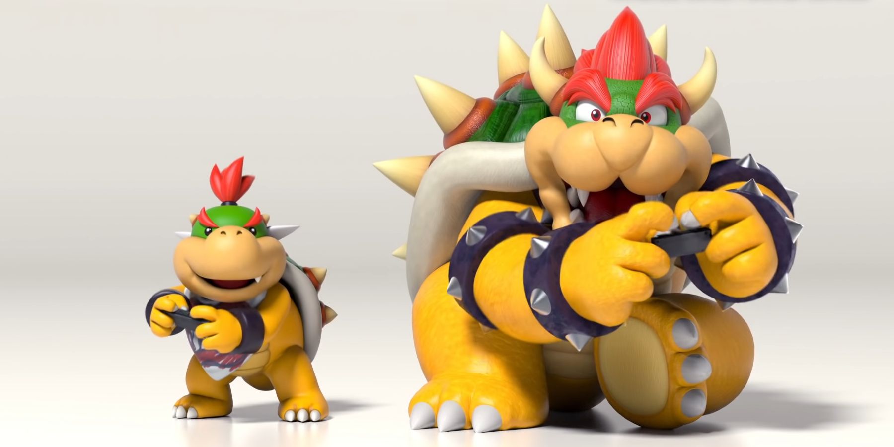 Bowser and Bowser Jr. playing together on the Nintendo Switch