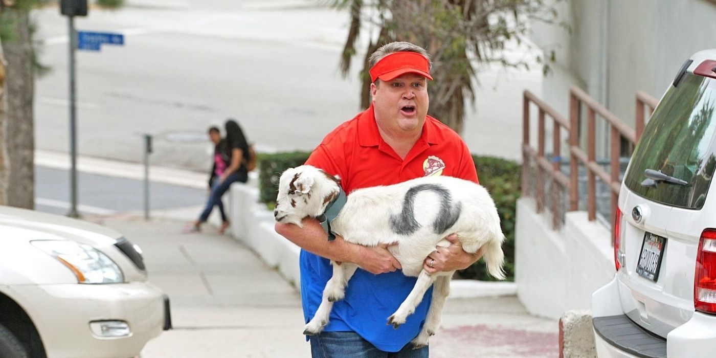 Cam running with a goat in Modern Family