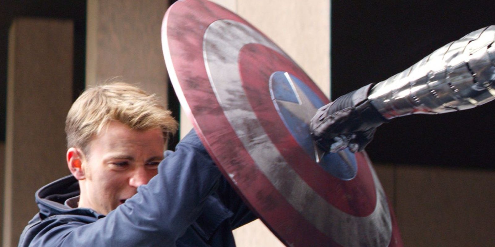 Captain America holding back The Winter Soldier's punch with his shield in Captain America: The Winter Soldier