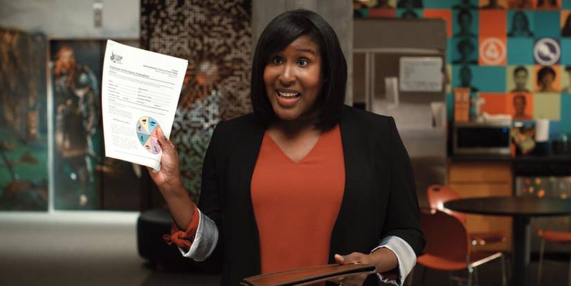 An image of Carol holding up a personality test in the show Mythic Quest.