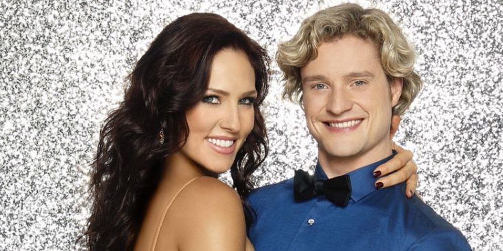 Charlie White poses with Sharna Burgess for a Dancing With the Stars promo photo