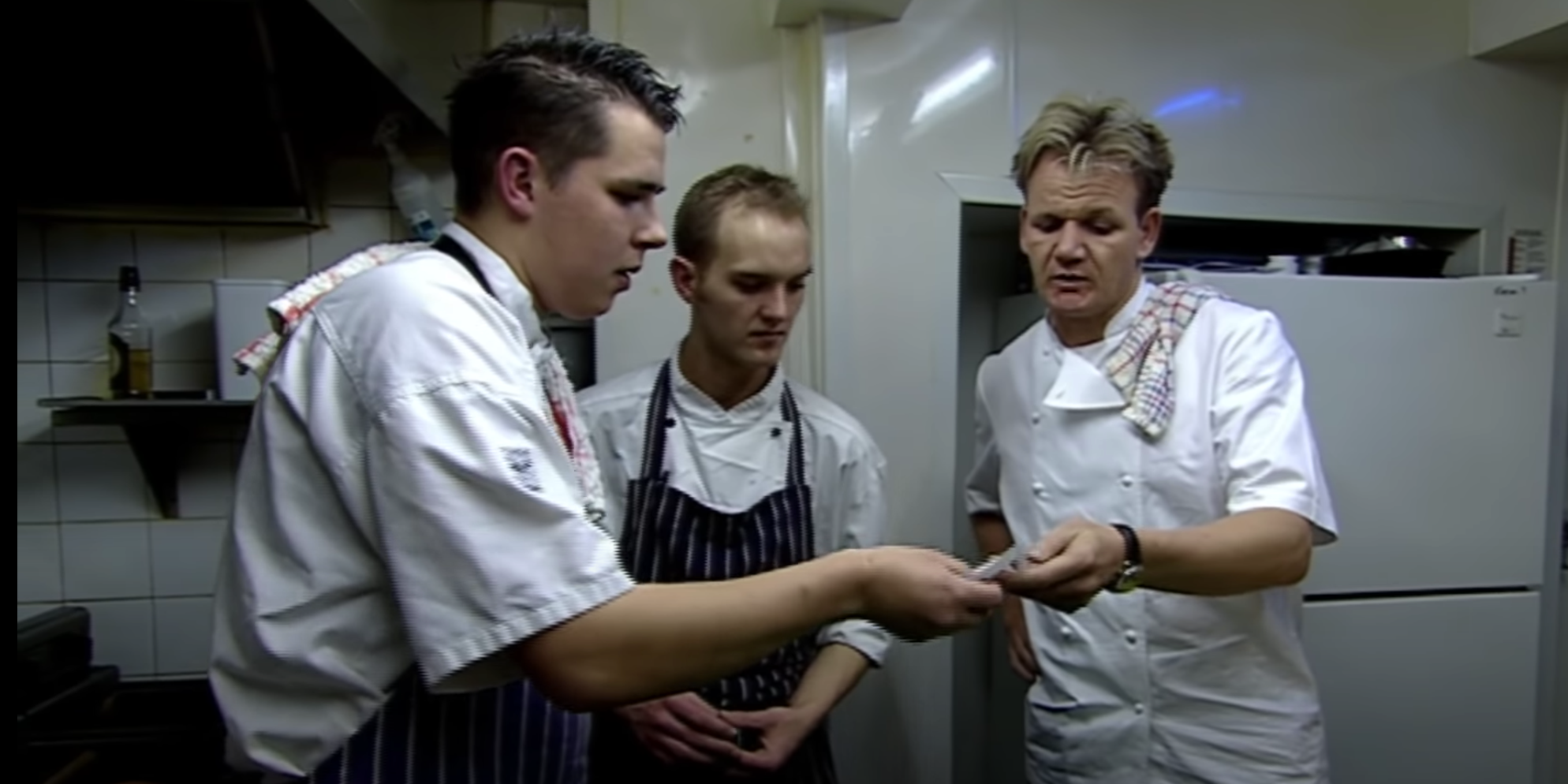 Chef Ramsay works with the chefs of Bonaparte's on a meal service.