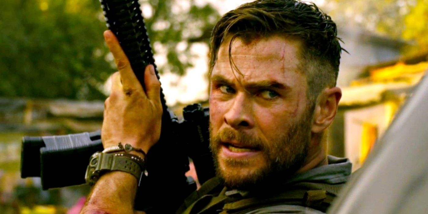 Chris Hemsworth, as Tyler Rake, takes cover in Extraction