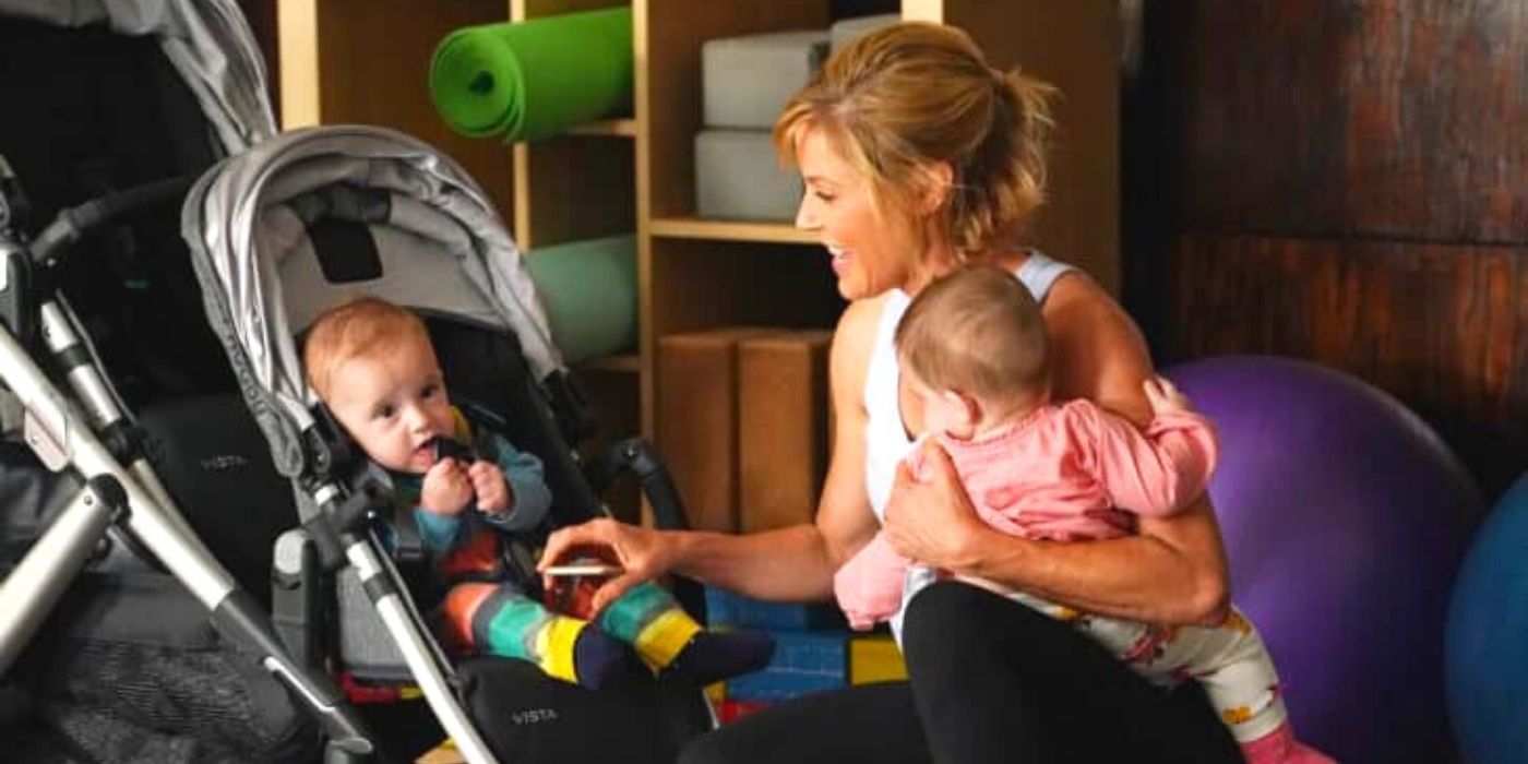 Claire Holds Her Grandkids On Modern Family 