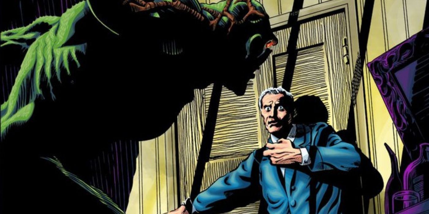 Swamp Thing scares a man in a dark room in DC Comics.