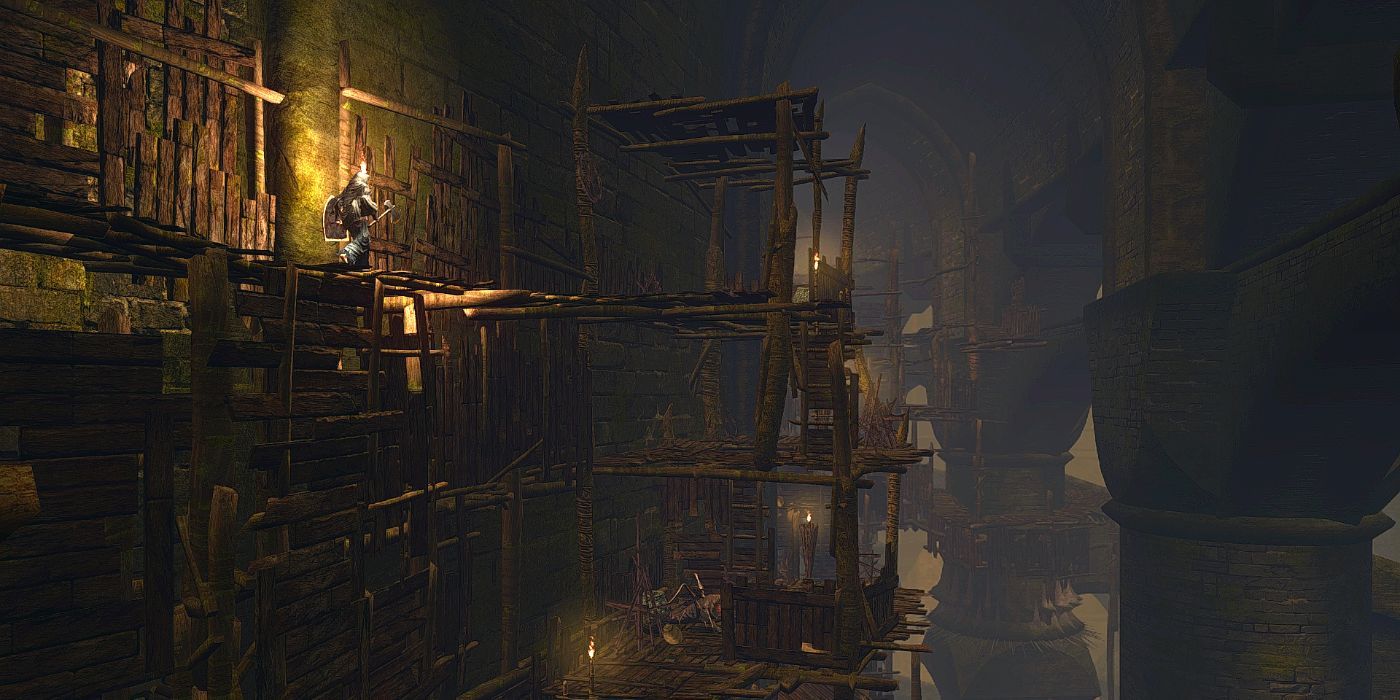 A player descends the scaffolding of Blighttown in Dark Souls.