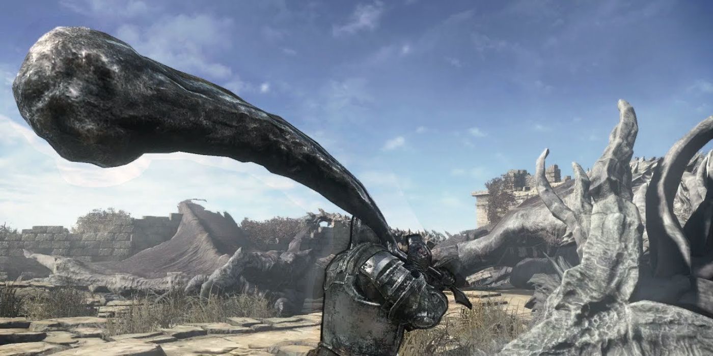 The player wields the Dragon's Tooth in Dark Souls.