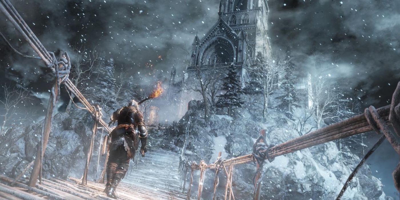 A player crosses a bridge to the Painted World of Ariamis in Dark Souls.