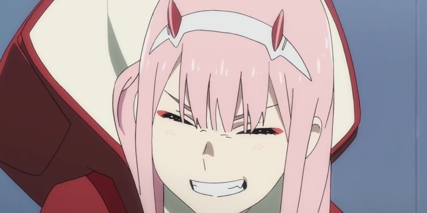 Zero Two giving a teethy smile in Darling In The Franxx